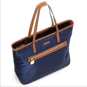 Michael Kors navy blue and brown leather purse